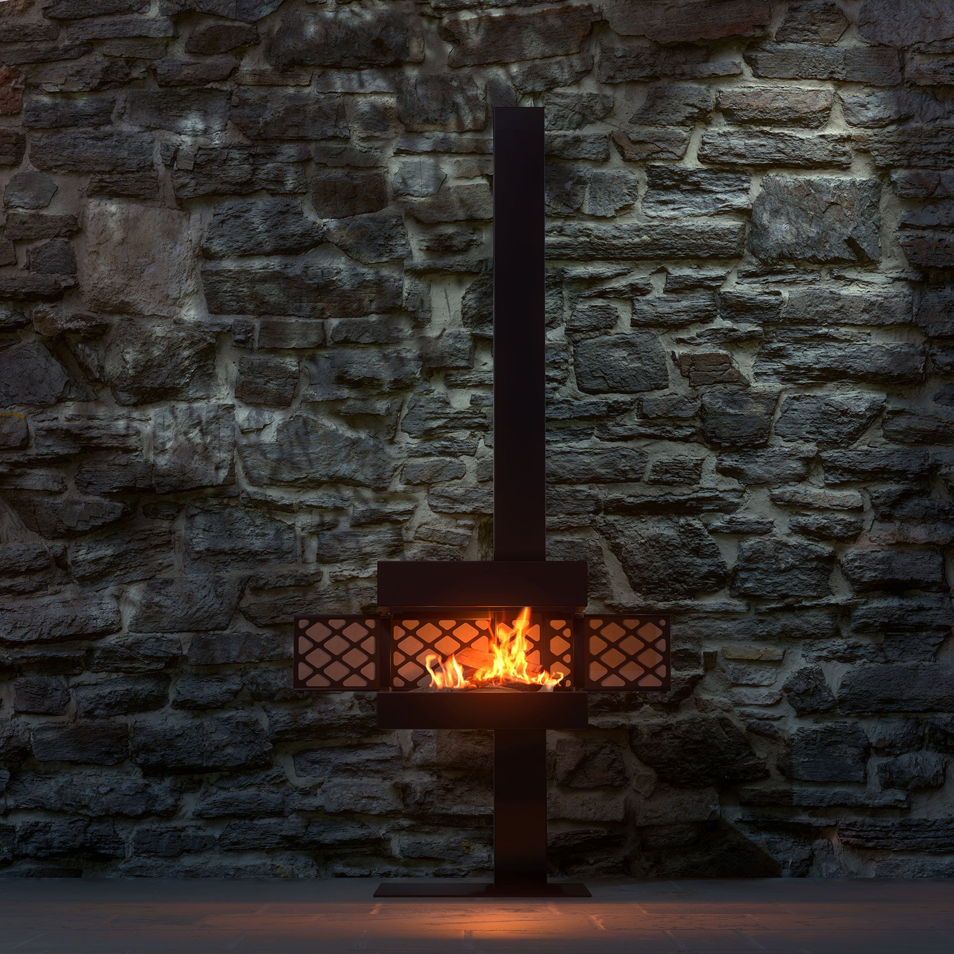 Der Gartenkamin von dyook brennt, die Kaminklappen sind seitlich geöffnet. Die Feuerstelle steht vor einer Steinwand auf einer Terrasse.